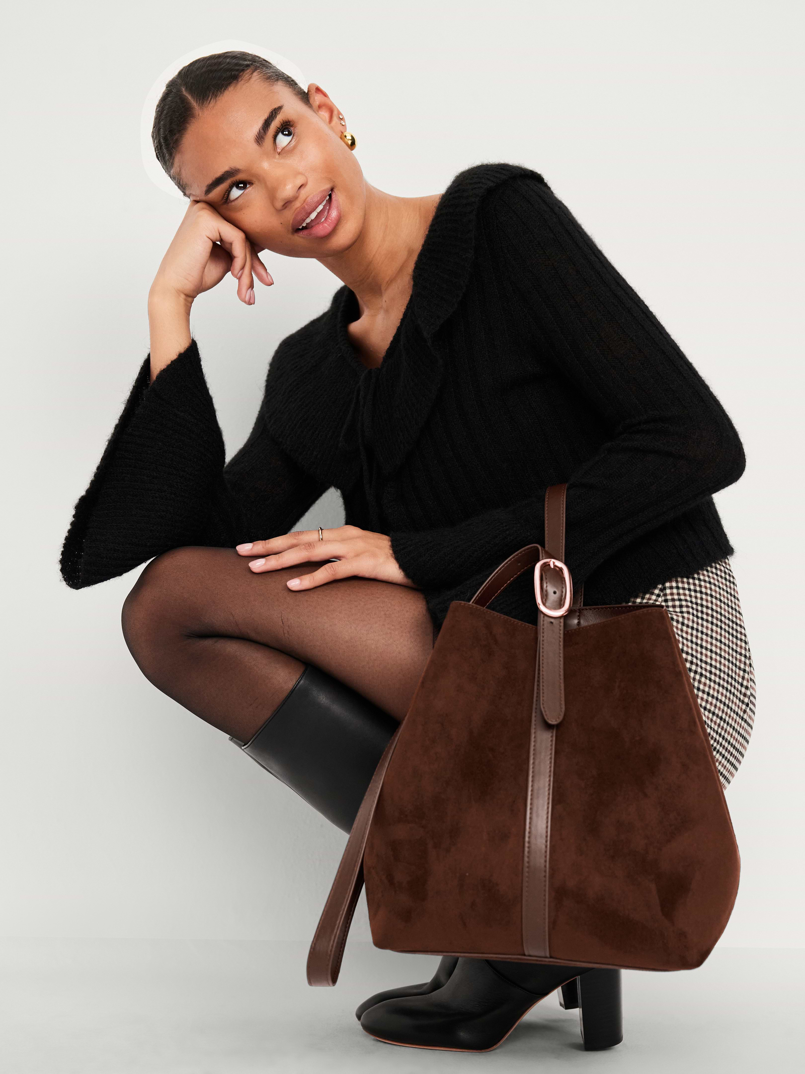 Model carrying the Old Navy Medium Carrie Tote Bag in Dark Chocolate faux suede.